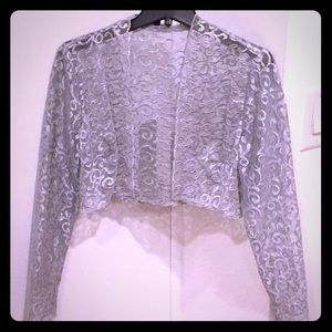 Silver see through shawl.